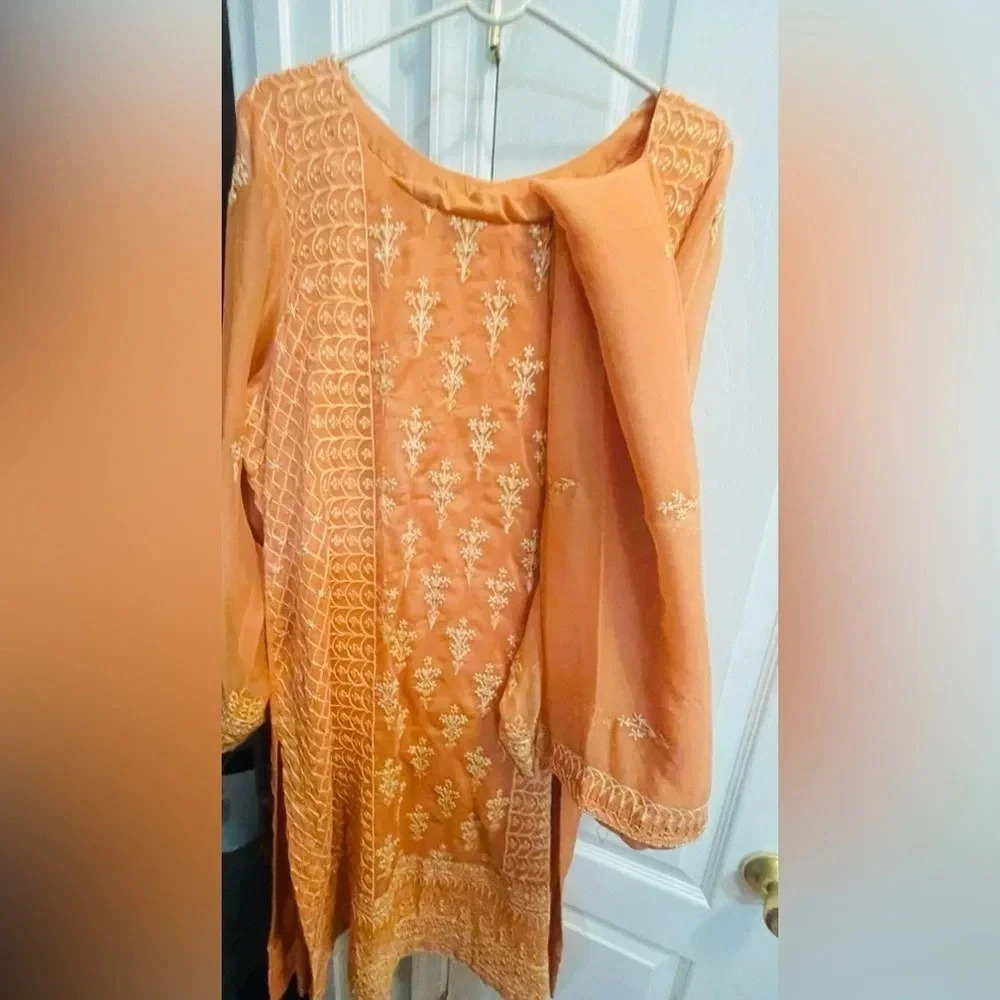 Brand new Dark peach suit